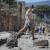 6. Pablo Esparza/Heraldo de México Pompei, 19 agosto 2020. Una giovane ragazza con mascherina salta sull'antico basolato  di Pompei dopo la riapertura dei  siti turistici.