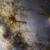 Una dettagliatissima immagine del centro della galassia: ammassi di stelle e nebulose definiscono la trama della Via Lattea