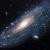 La grande Galassia di Andromeda, a 2,2 milioni di anni luce di distanza. La luce di questa immagine è partita quando sulla Terra ancora si stavano evolvendo i primi ominidi.